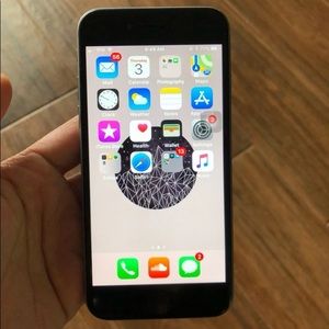 iPhone 6 with case and headphones